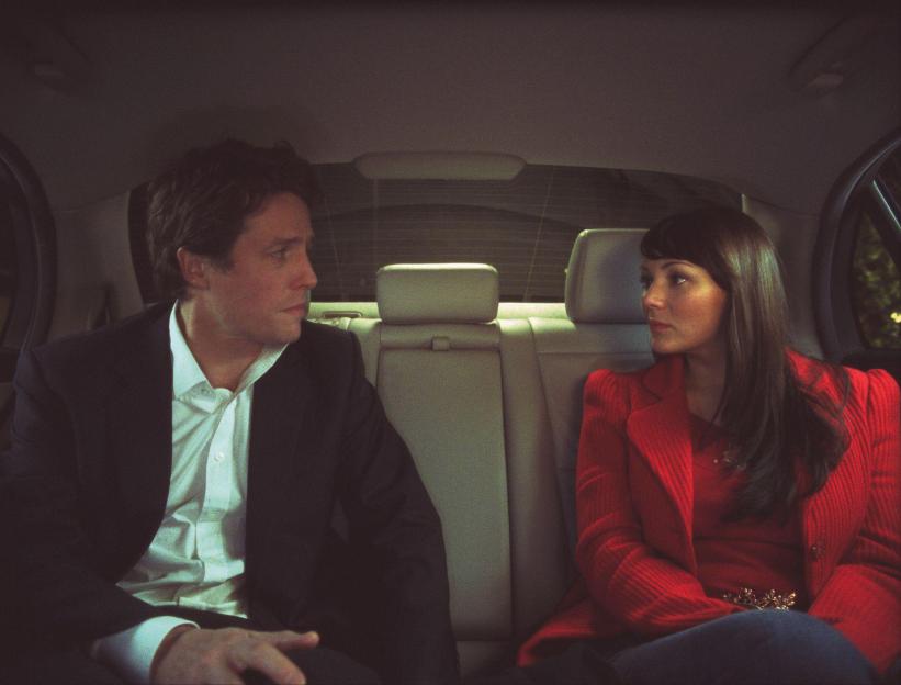 Hugh Grant and Martine McCutcheon in a car from *Love Actually*.
