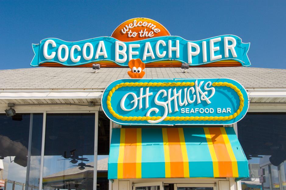 Oh Shucks Seafood Bar sign at the Cocoa Beach Pier.