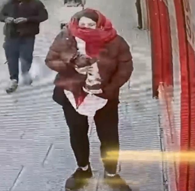 CCTV footage of Constance Marten holding baby Victoria under her coat.