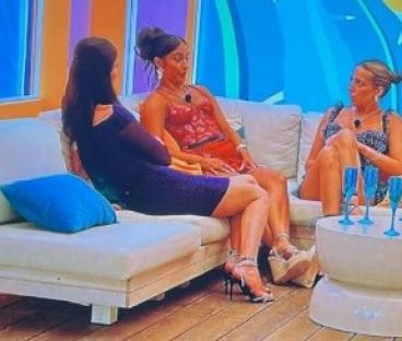 Screenshot of three women on Love Island.