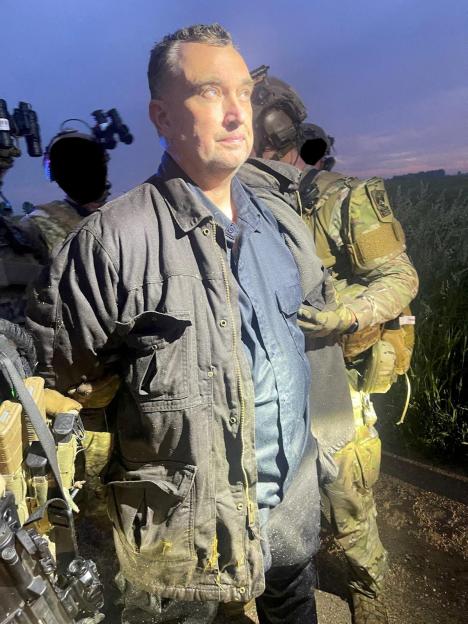 Handout photo of Vance Luther Boelter in custody.