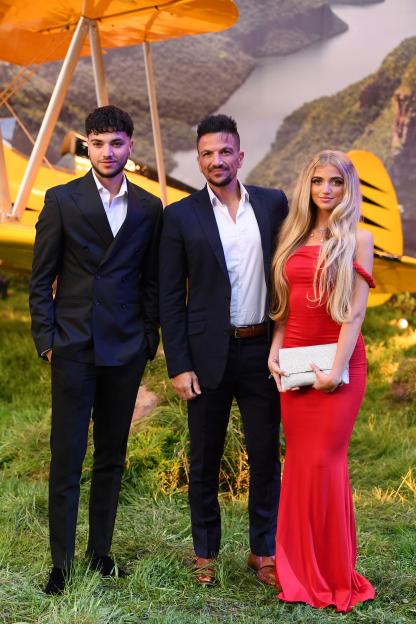 Junior, Peter, and Princess Andre at a film premiere.