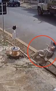 CCTV grab of a passenger falling out of a moving Uber.