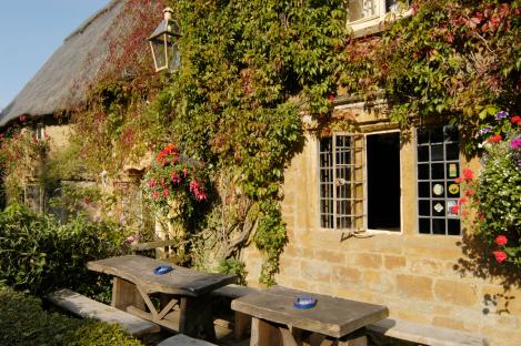 The Falkland Arms public house, a thatched pub in Great Tew, Oxfordshire.