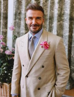 David Beckham in a tan suit at the RHS Chelsea Flower Show.