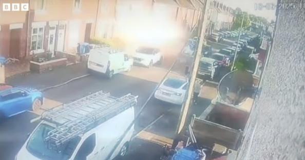 Security camera footage of a house explosion.