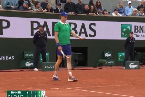 Tennis player on court during a match.