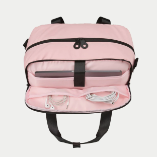 Pink bag open, showing laptop and cords inside.