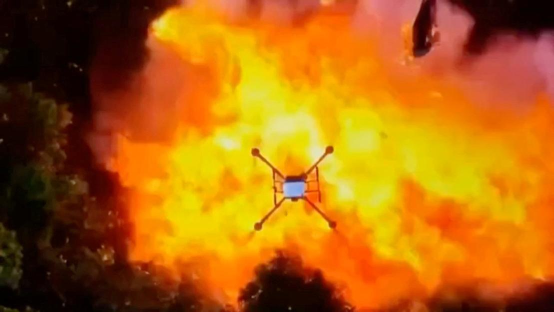 Drone over a fire and smoke.