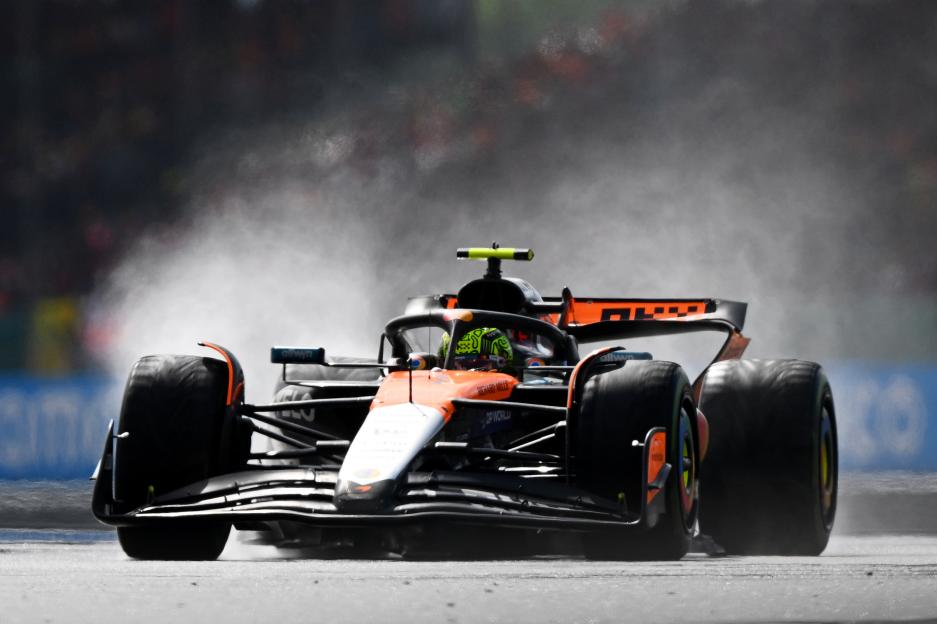 Lando Norris driving a McLaren Formula 1 car at Silverstone.