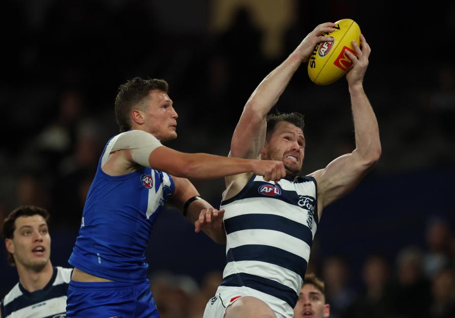 Patrick Dangerfield marking the ball during an AFL match.