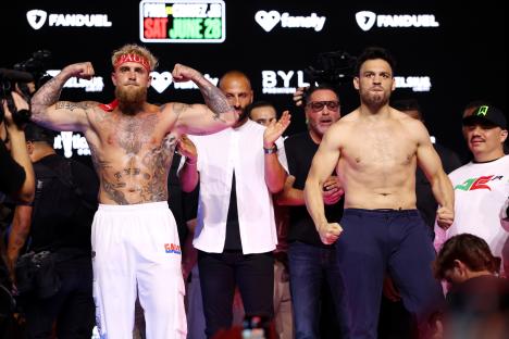 Jake Paul and Julio Cesar Chavez Jr. at a boxing weigh-in.