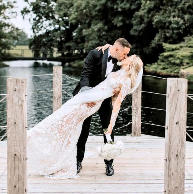 HOLD FOR PERMISSION TO USE : CHLOE KELLY MARRIES SCOTT MOORE : Few moments in @ Chloe Kelly s life can compare to scoring the winning goal for the #Lionesses in Englands Euros final clash with Germany in 2022, but her wedding day is definitely one of them. The footballer married her long-term boyfriend, @ScottJM22, at Merrydale Manor in Cheshire wearing a shimmering @GaliaLahav gown, as their loved ones including Chloes fellow Lionesses looked on. Click the link in bio for an exclusive look inside their ceremony...Photographed by @TheSallyRawlins.