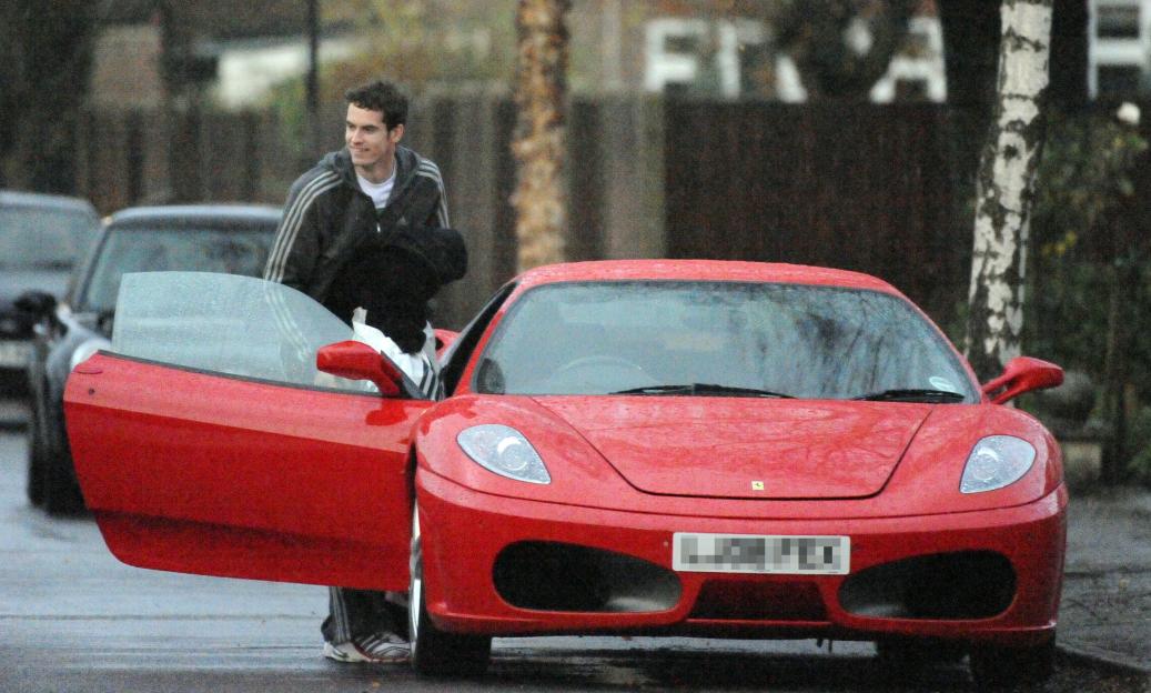 Andy Murray with his new red Ferrari.
