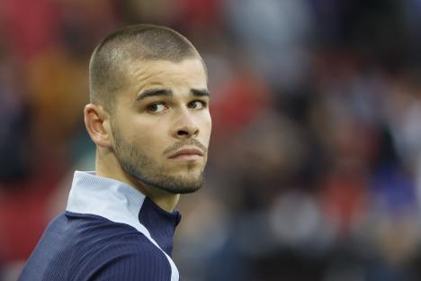 Lucas Chevalier, French goalkeeper, at a football match.