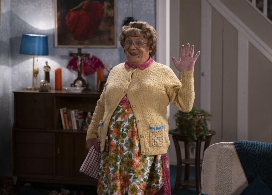 Mrs. Brown waving.