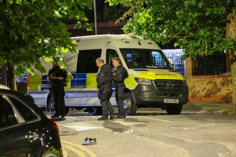 Police officers at a crime scene.