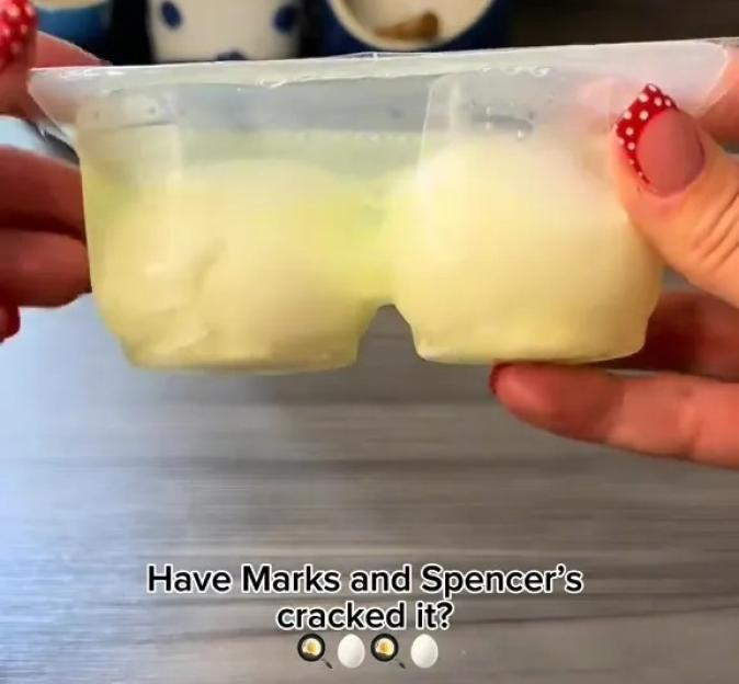 Microwave poached eggs in a plastic container.