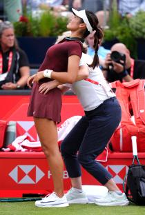 Emma Raducanu receiving treatment during a tennis match.