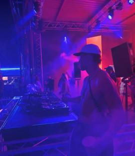 DJ performing at a nightclub.