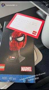 Lego Spider-Man helmet set and congratulatory letter.