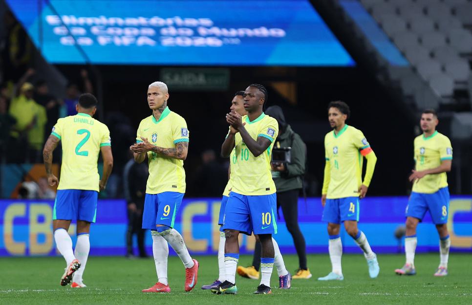 Brazilian soccer players celebrating after a match.