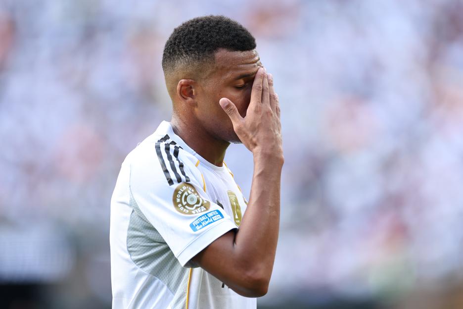 Kylian Mbappé of Real Madrid reacting during a soccer game.