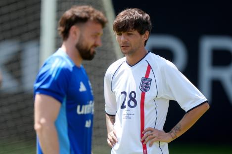 Louis Tomlinson and Sam Thompson at a Soccer Aid training session.