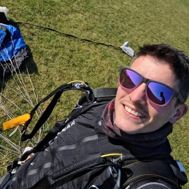 Selfie of a smiling skydiver.