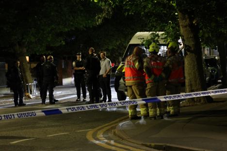 Emergency responders at a crime scene.