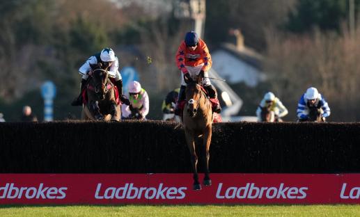 Horse race at Kempton Racecourse.