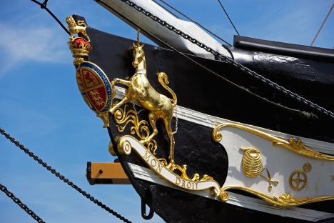 Bow of the SS Great Britain with gilded unicorn and royal coat of arms.
