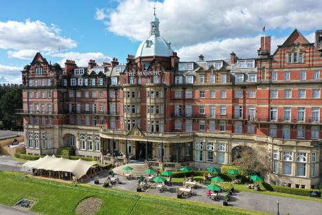 Aerial view of The Majestic Hotel with outdoor seating.