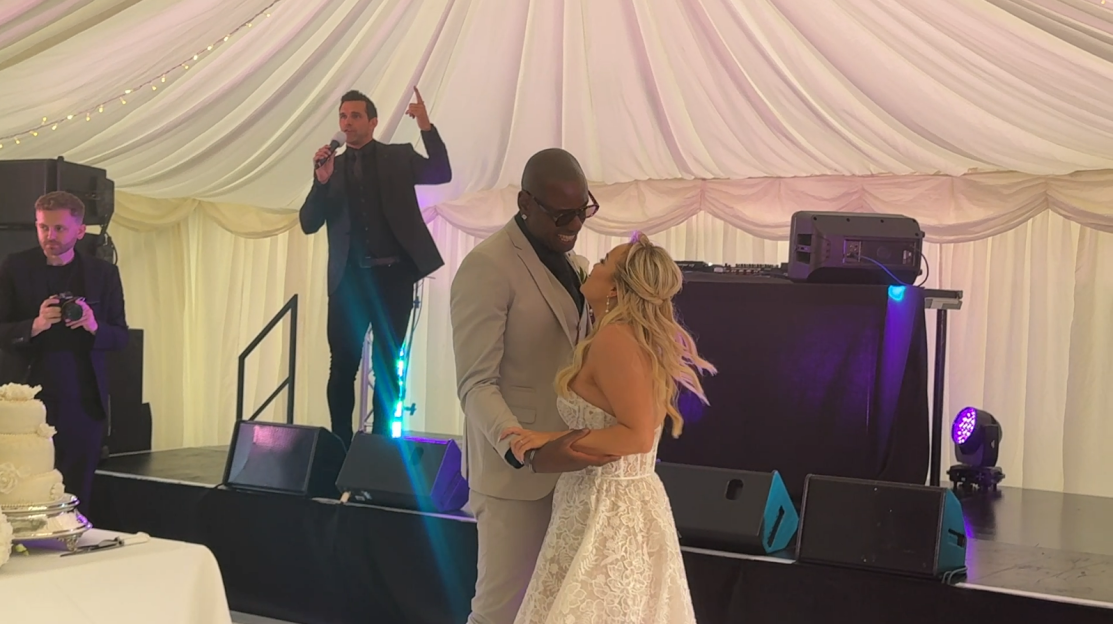 Bride and groom dancing at their wedding reception.