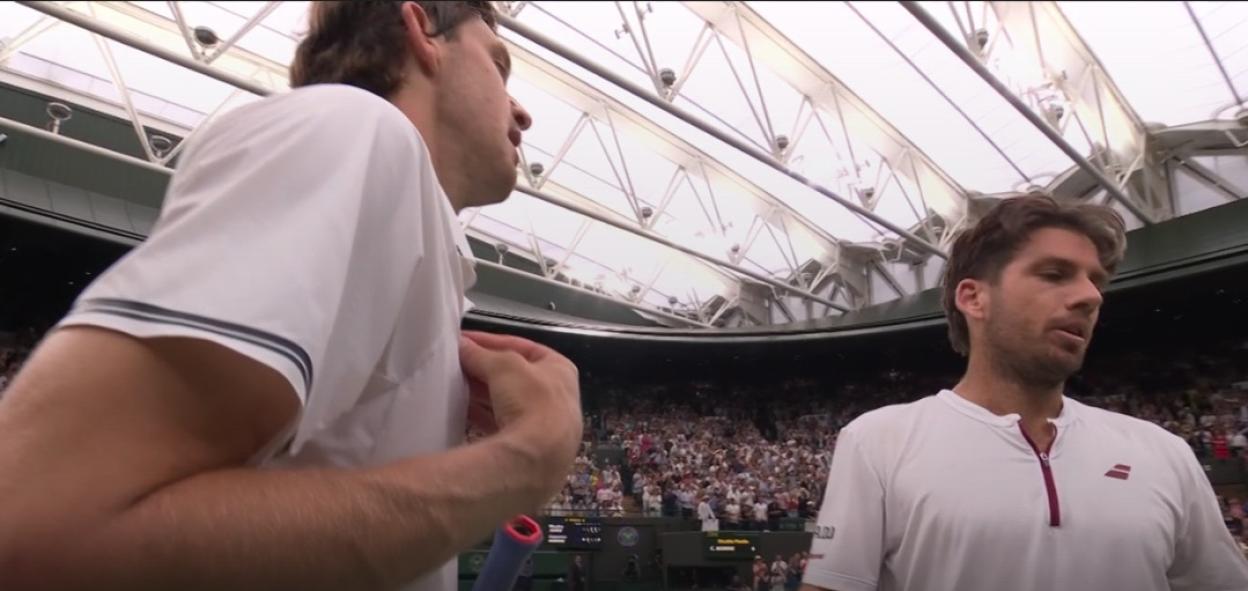 Two tennis players at Wimbledon.