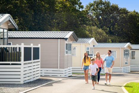 Family walking in front of vacation homes.