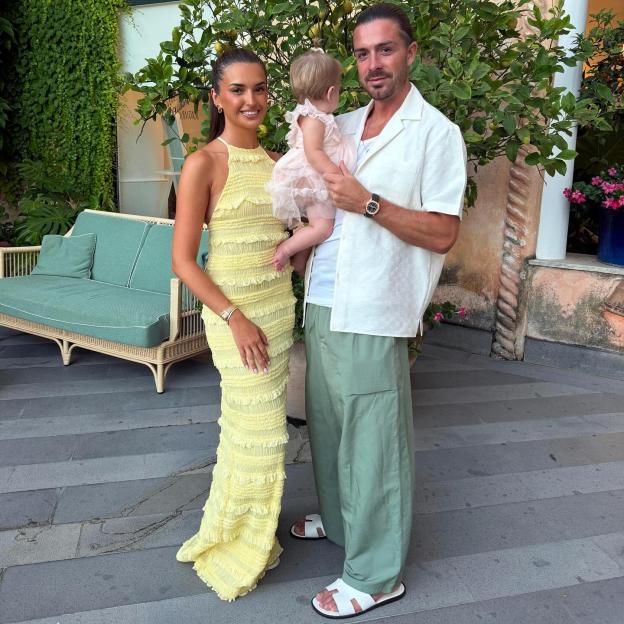 Jack Grealish with his girlfriend and daughter.
