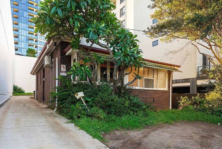 Brick house with residential and commercial zoning approval.