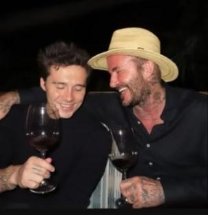 David Beckham and Brooklyn Beckham share a laugh and wine.