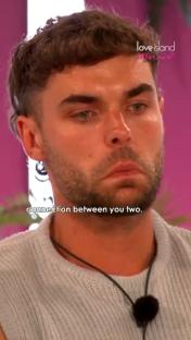 Love Island's Harry crying.