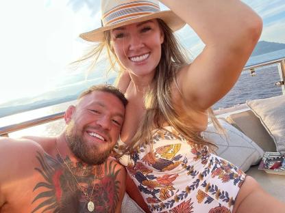Conor McGregor and Dee Devlin relaxing on a yacht.