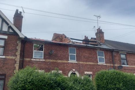 Fire-damaged terraced houses.