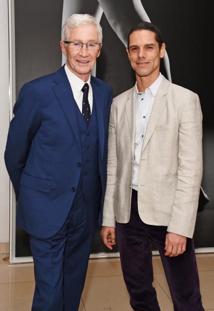 Paul O'Grady and Andre Portasio at an opening night event.
