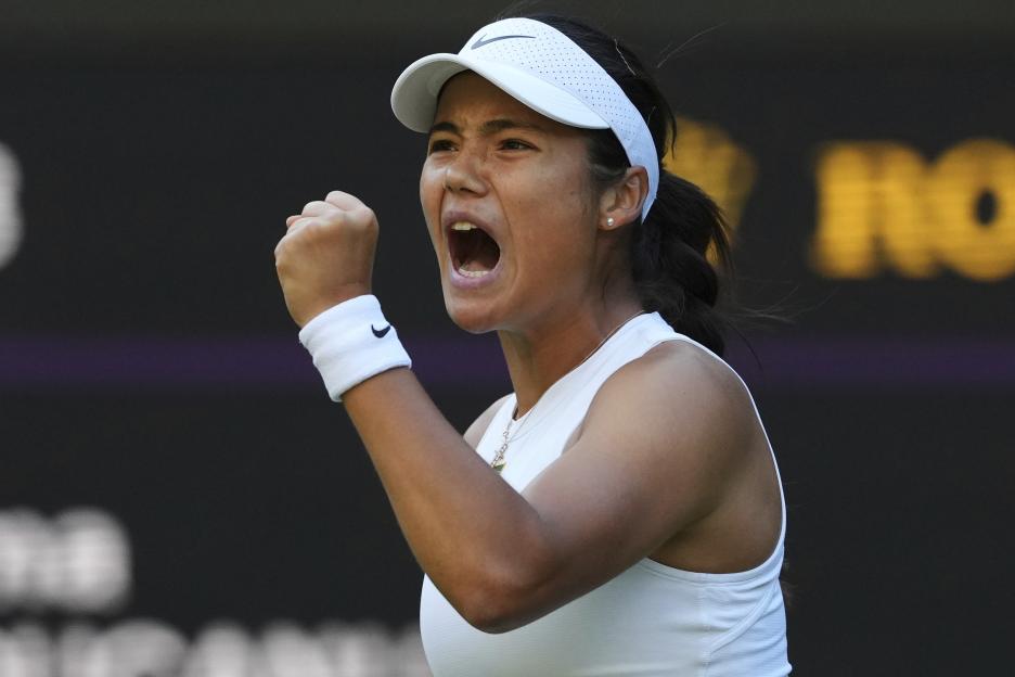 Emma Raducanu celebrating during a tennis match.