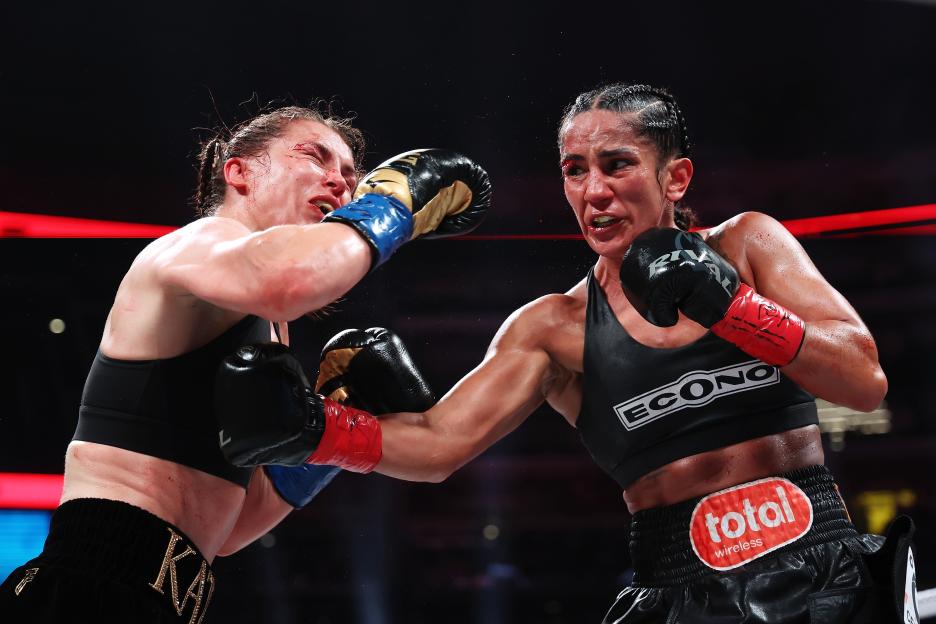 Katie Taylor and Amanda Serrano boxing.