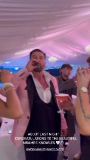 Nick Knowles and his wife celebrating at their wedding reception.