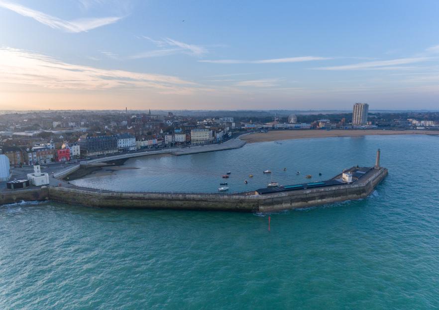 Aerial view of Margate harbour at dawn.