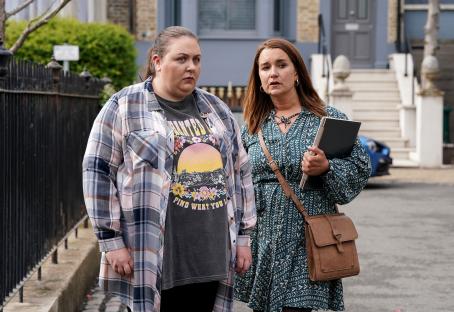 Still image from EastEnders episode 7144 showing Bernadette Taylor and Vicki Fowler walking down a street.