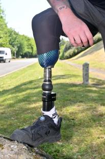 Close-up of a man's prosthetic leg.