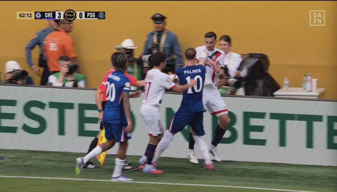 Soccer players celebrating a goal.